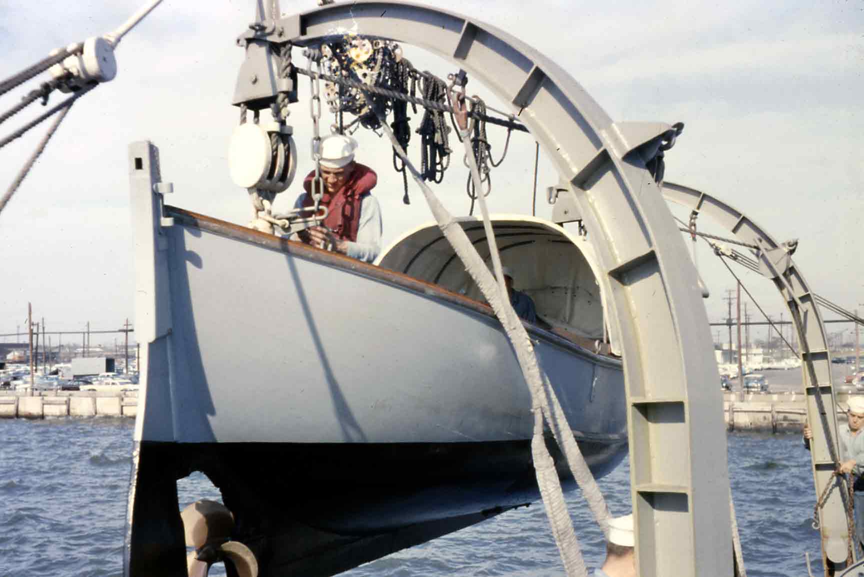 Photo - hoisting the motor whaleboat