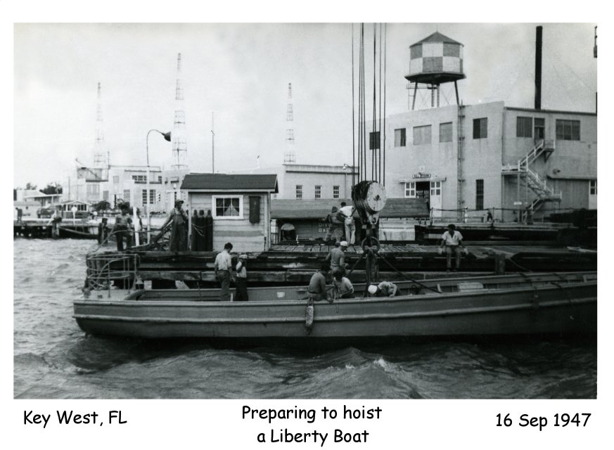 Photo - Preparing to hoist a liberty boat